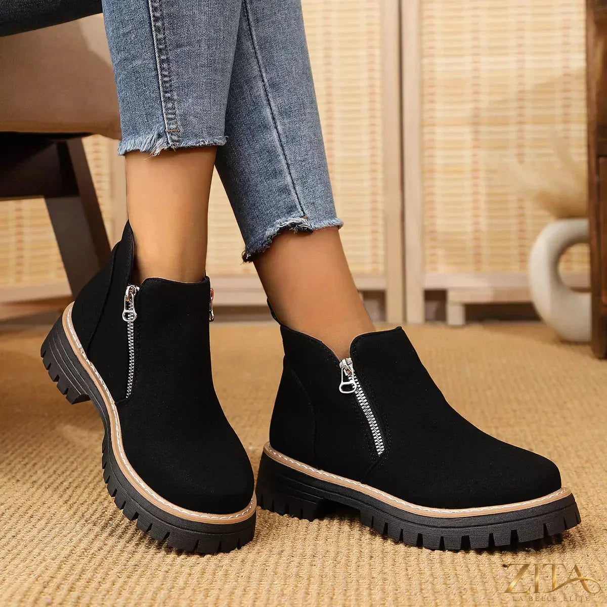 Zita La Belle Elite ankle boots with zipper accent, showcasing black leather with side zipper, stylish and trendy footwear.
