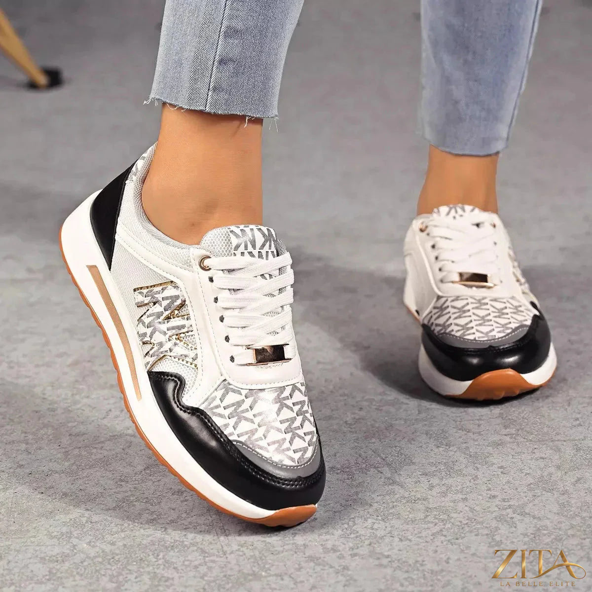 Zita La Belle Elite lace-up round toe sneakers with white and black design, showcasing breathable fabric and stylish casual footwear