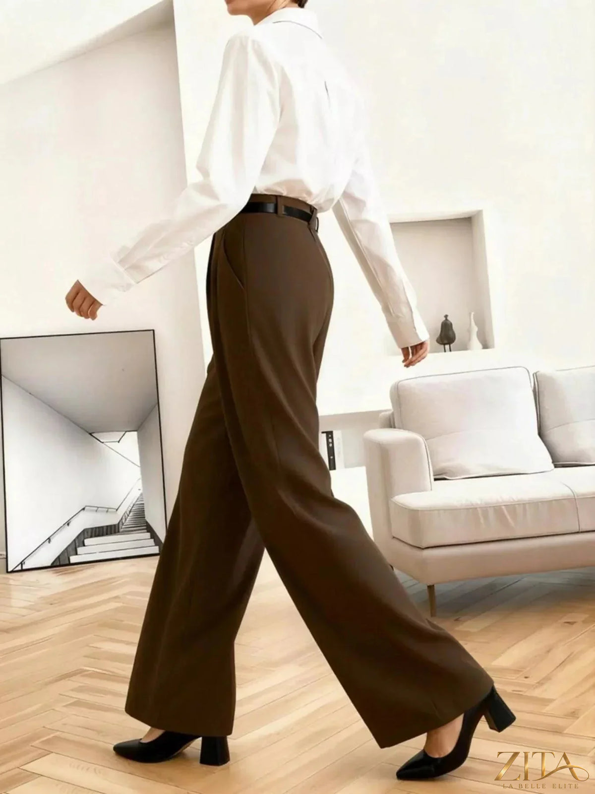 Zita La Belle Elite wide leg pleated pants in neutral fabric, featuring a high waist and flowing silhouette.