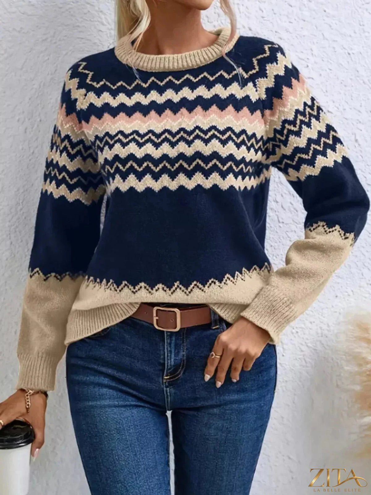Geometric pattern knitted sweater from Trendsi featuring a stylish design and cozy fabric in vibrant colors.