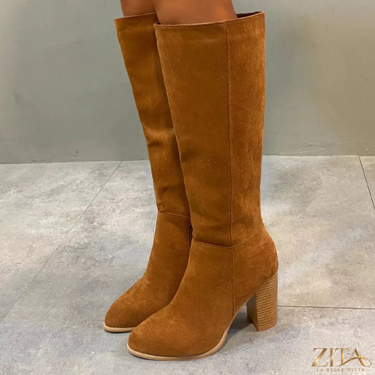 Zita La Belle Elite point toe block heel boots with sleek design and stylish black leather finish.