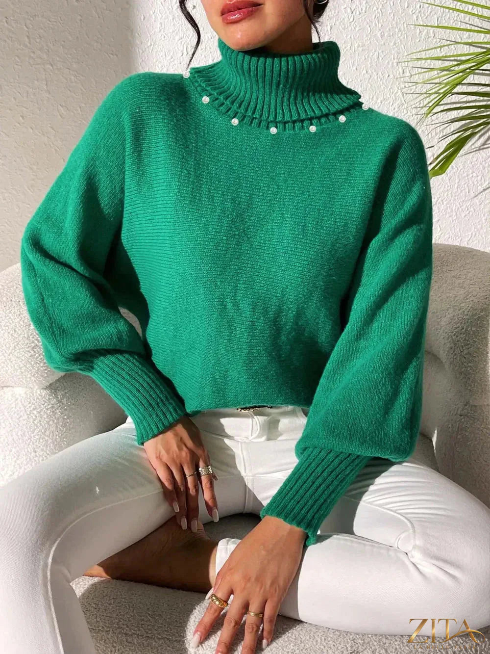 Zita La Belle Elite long sleeve turtleneck sweater in cozy knit fabric, shown in a close-up of the black sweater on a model.