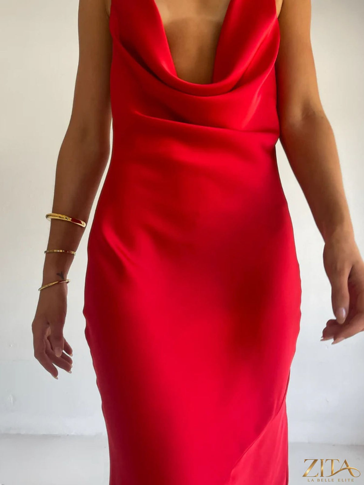Zita La Belle Elite halter neck satin maxi dress featuring a flowing silhouette and elegant design, suitable for formal occasions.