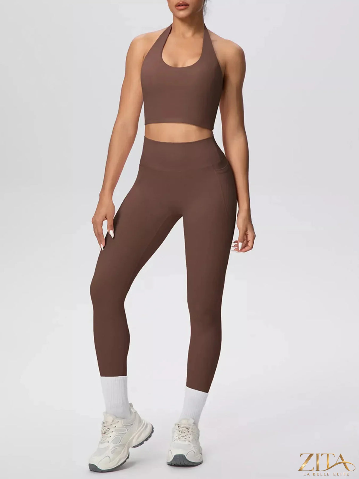 Zita La Belle Elite halter neck crop top and high-waisted leggings active set on a model, perfect for workout or casual wear.