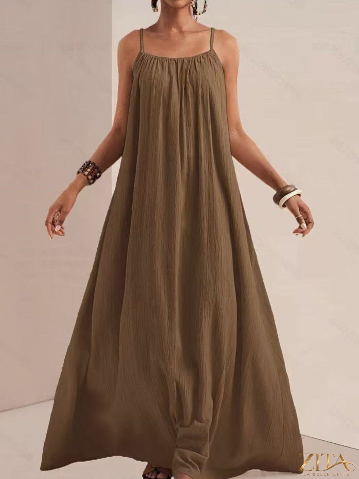 Flowy maxi dress with spaghetti straps from Zita La Belle Elite, featuring a lightweight, elegant design perfect for summer wear.