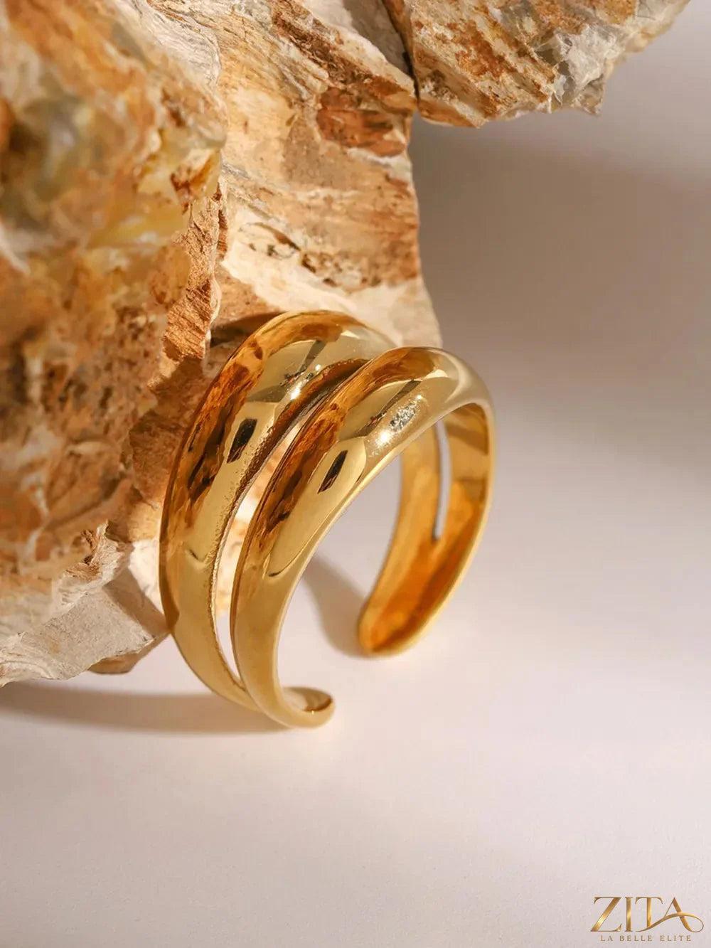 Stainless steel double-layered ring from Zita La Belle Elite, featuring sleek, polished metal with layered design and smooth edges.