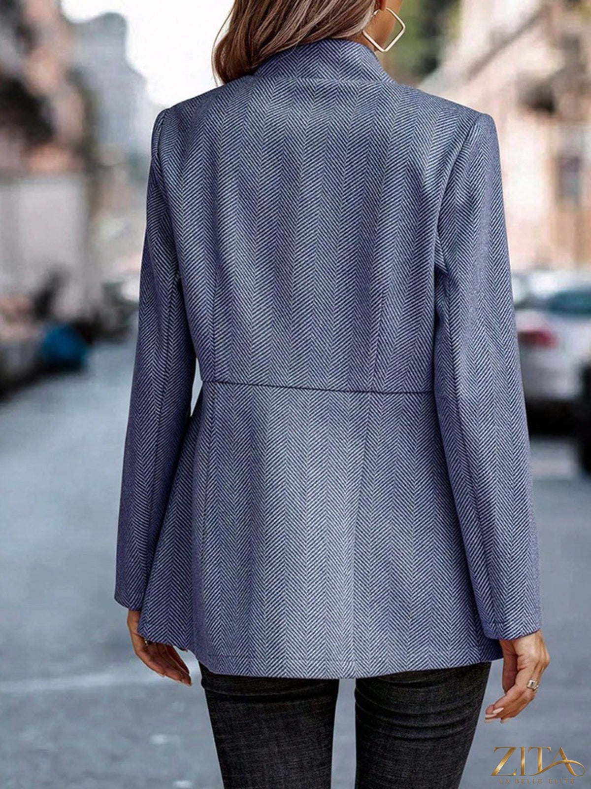 Slim fit open front blazer by Zita La Belle Elite, shown in black with tailored lapels and long sleeves.