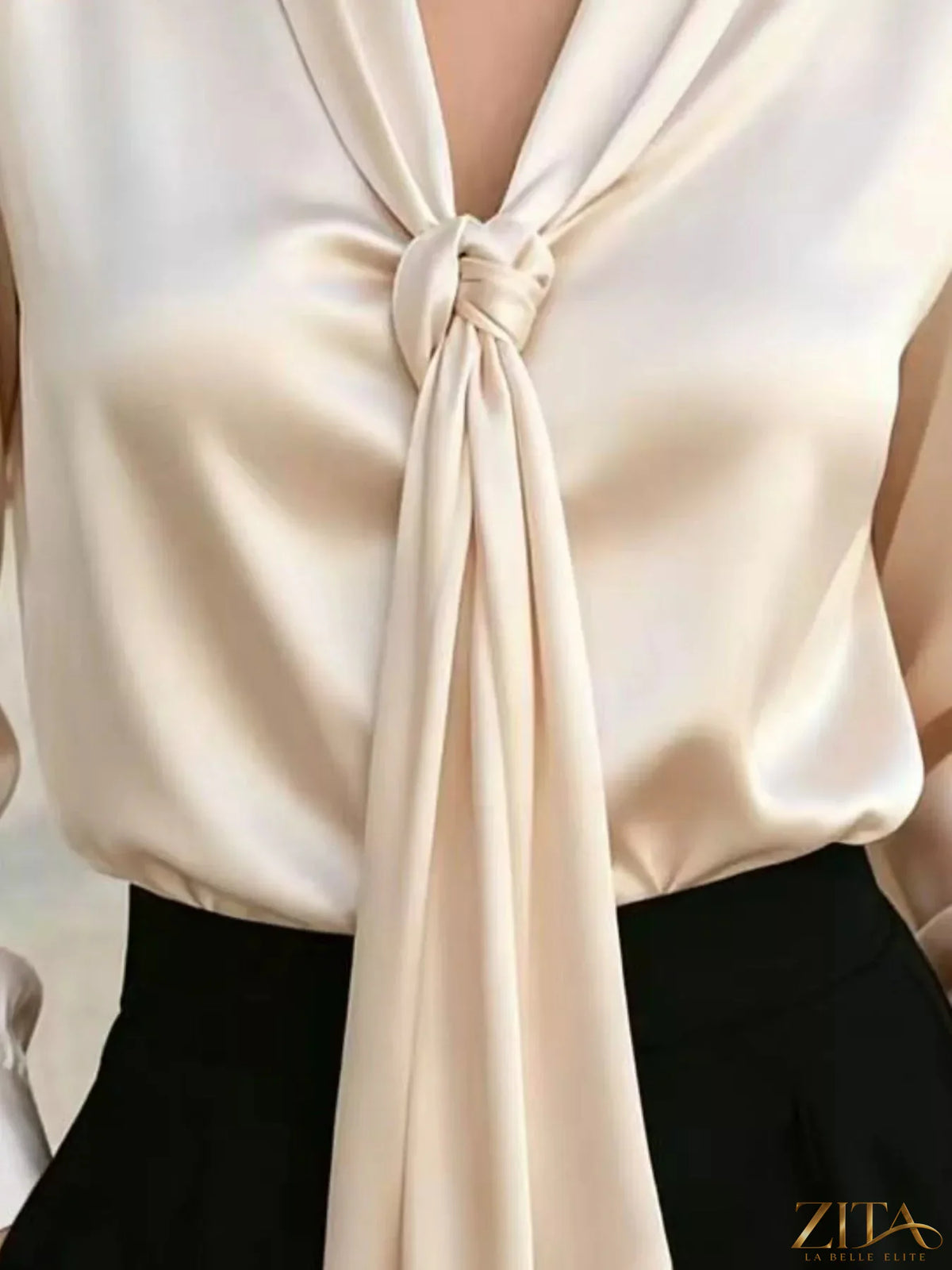 Zita La Belle Elite satin blouse with front tie detail, featuring a stylish and elegant design in a smooth, shiny fabric.