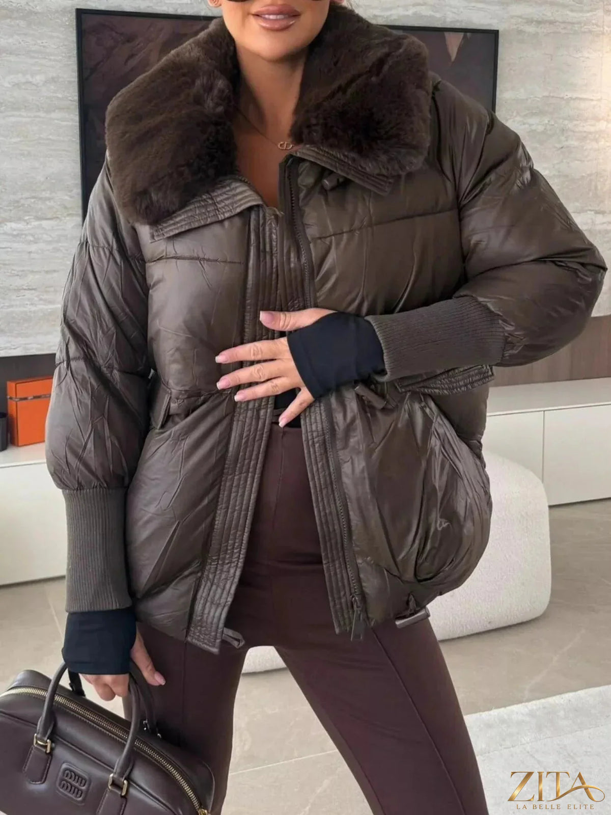 Zita La Belle Elite padded puffer jacket with a plush fur collar, black winter coat with quilted design and front zipper.