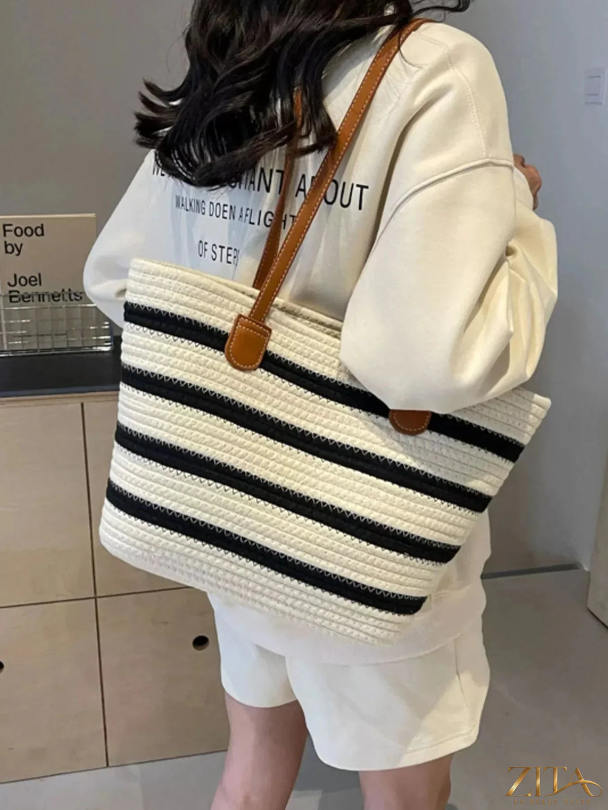 Zita La Belle Elite striped straw tote bag with woven design and leather handles, perfect for summer beach outings and casual use.