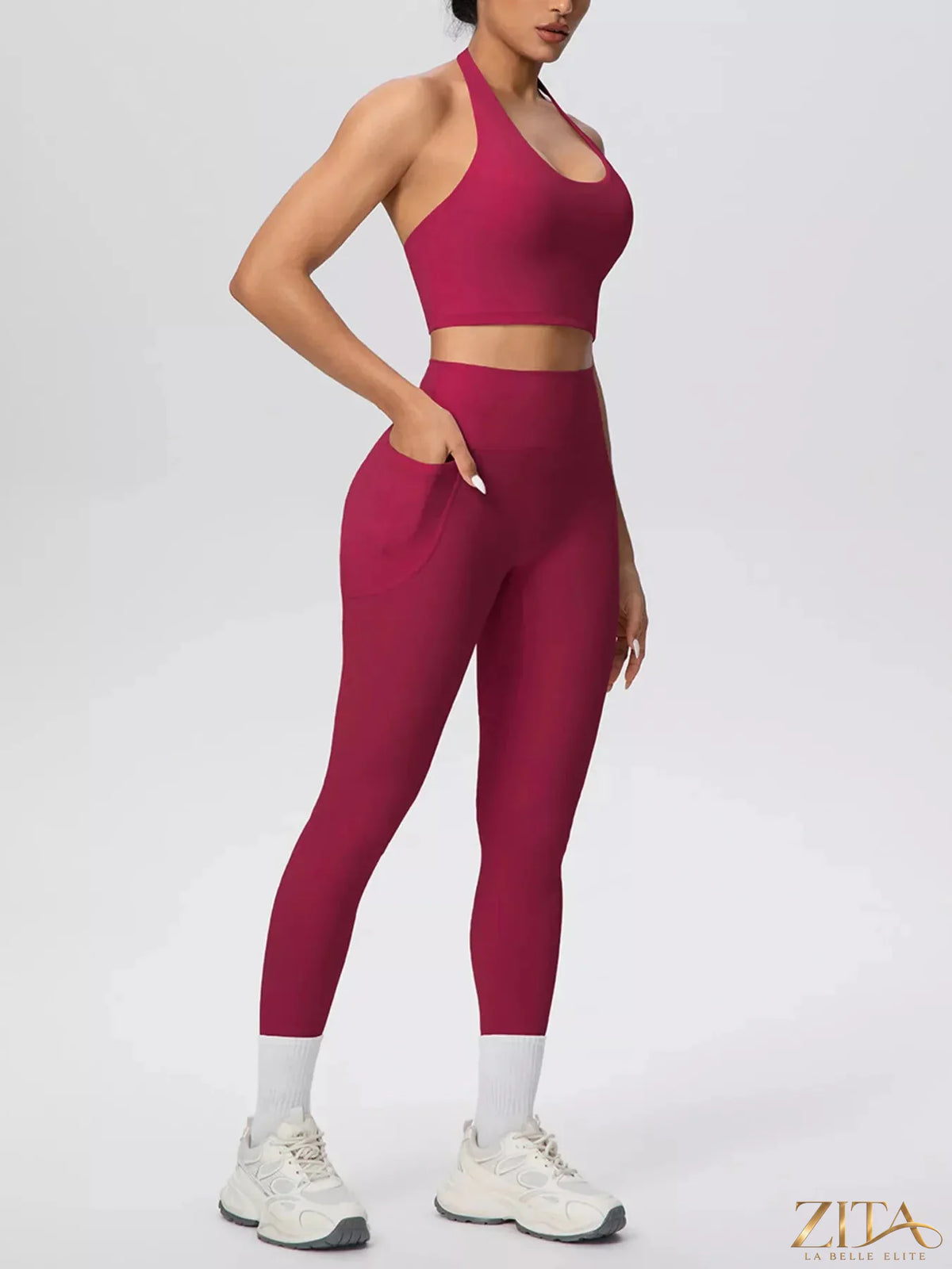 Zita La Belle Elite halter neck crop top and high-waisted leggings active set on a model, perfect for workout or athleisure wear.