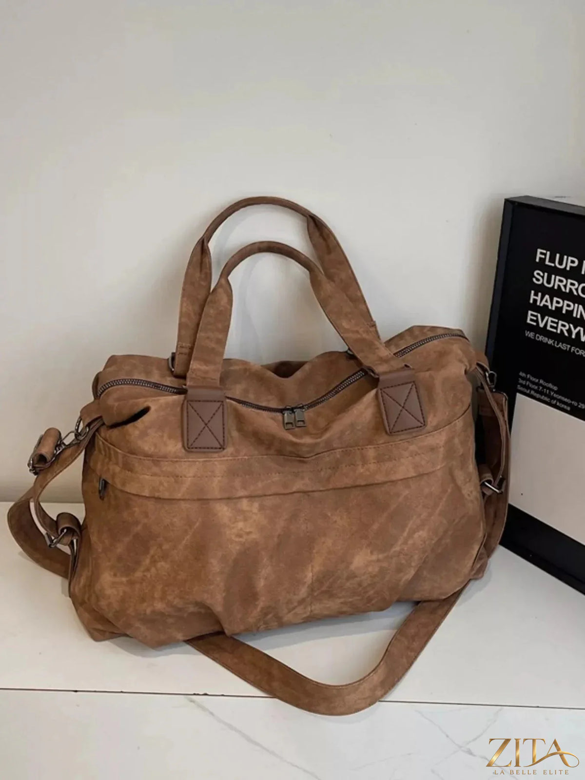 Vintage Zita La Belle Elite adjustable strap duffel bag with leather accents and spacious interior, ideal for travel and weekend trips.