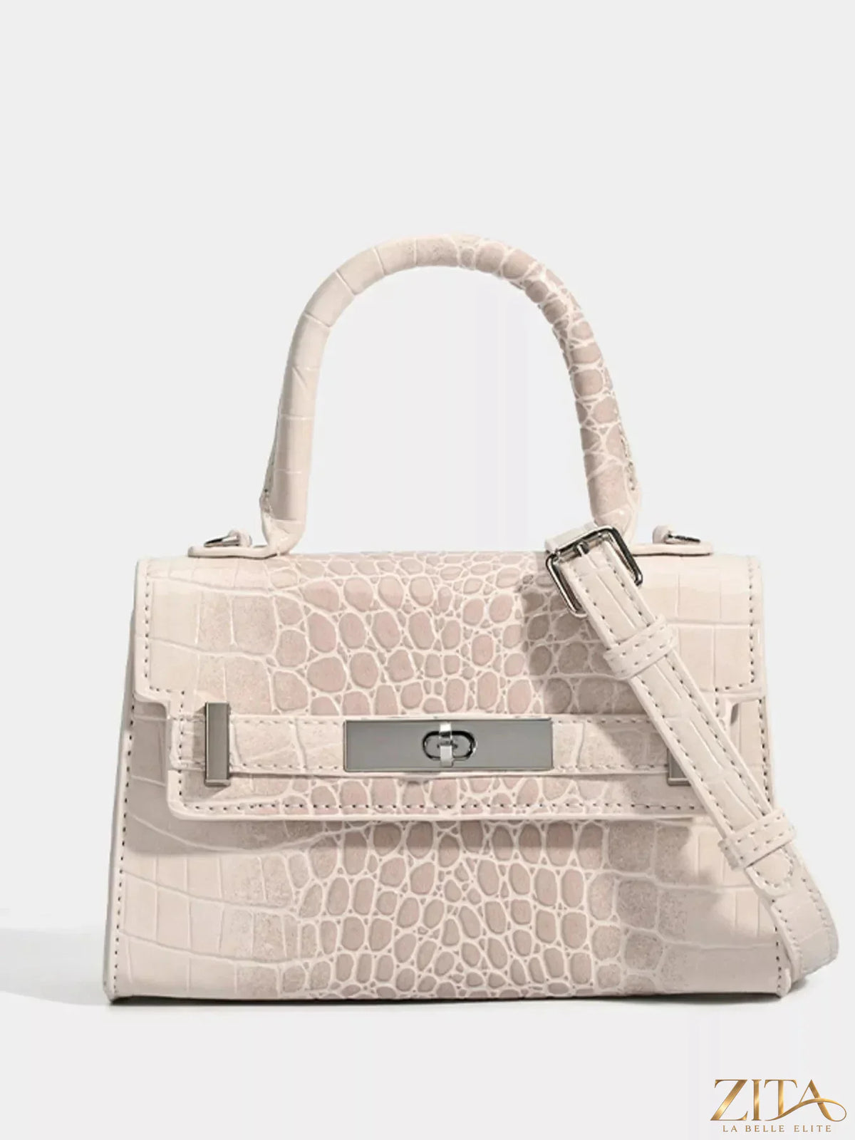 Zita La Belle Elite croc-embossed top handle handbag with gold-tone hardware and structured design on a neutral background.