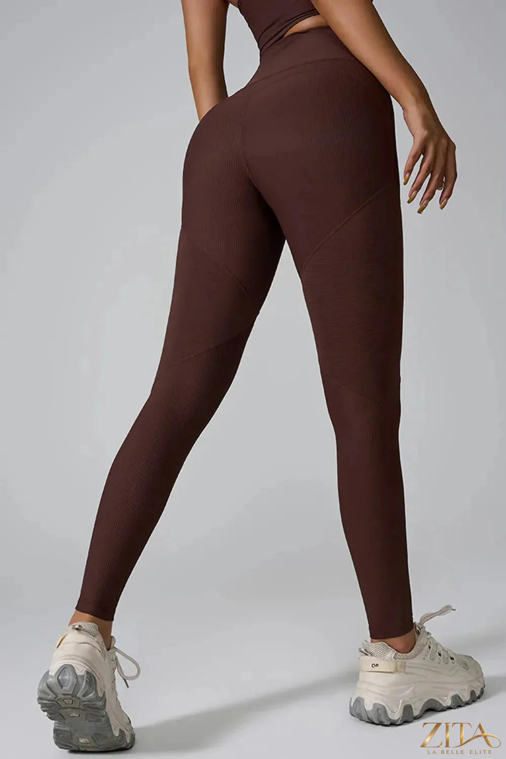 High waist active leggings by Trendsi featuring a stretchy black fabric with a snug fit for workout and casual wear.