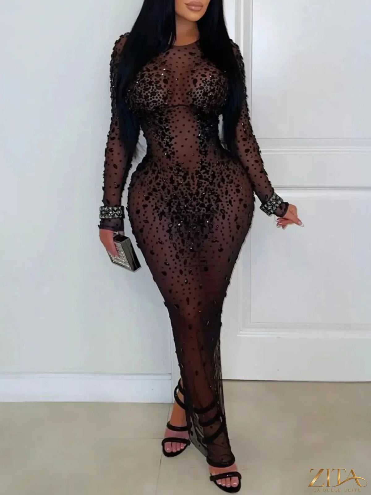 Sheer mesh long sleeve evening dress with rhinestone embellishments by Zita La Belle Elite, featuring a fitted silhouette and intricate details.