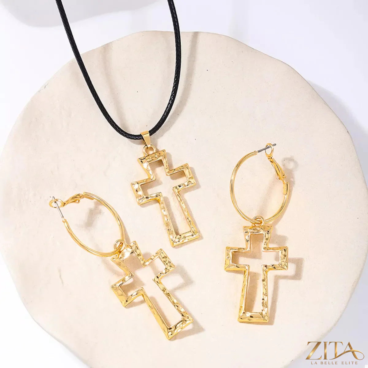 Trendsi cross pendant necklace and hoop earrings jewelry set featuring a silver-tone cross pendant and matching hoop earrings.