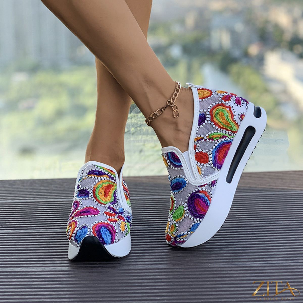Printed platform round toe sneakers by Zita La Belle Elite with bold patterns and chunky soles in a stylish, casual design.