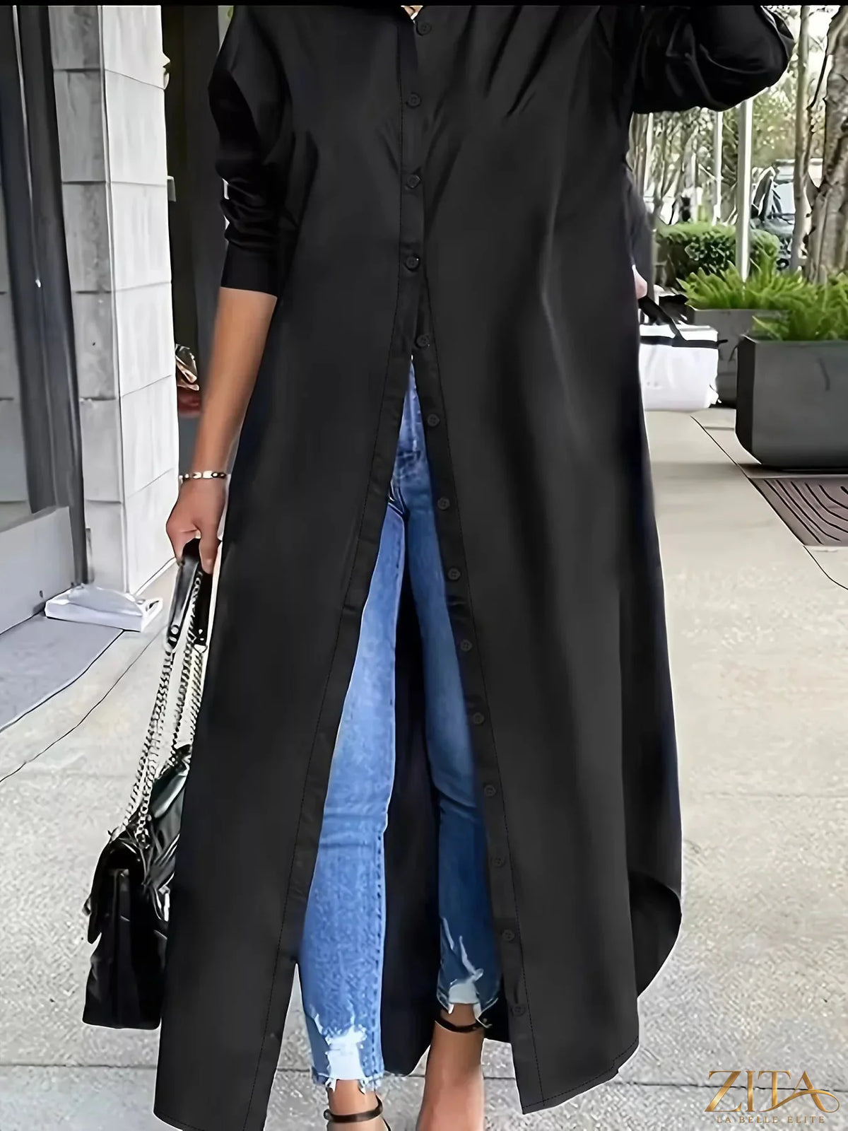 Plus size longline button-down shirt by Zita La Belle Elite, shown in a relaxed fit with a collar and front buttons.
