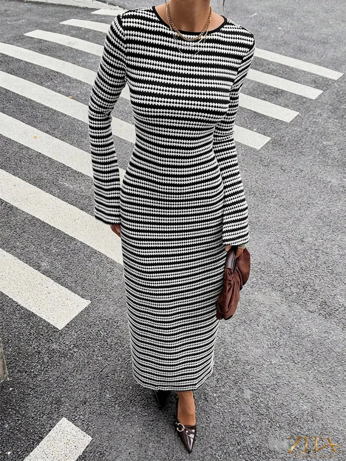 Zita La Belle Elite striped flared sleeves sweater dress showing bold pattern and stylish fit on a model.