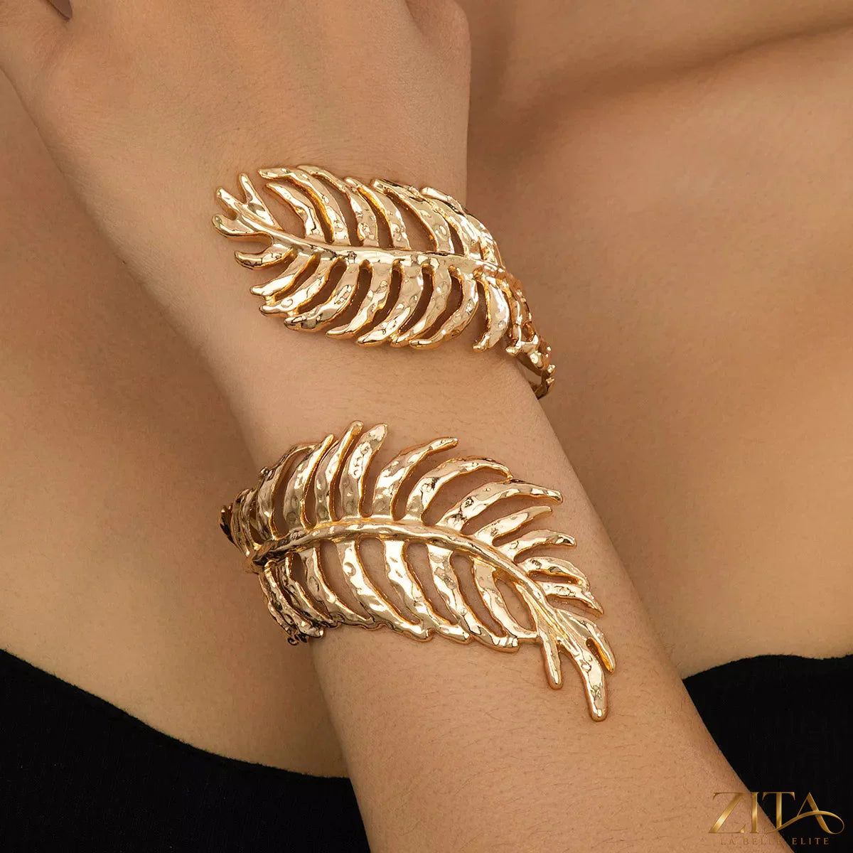 Gold-plated alloy leaf bracelet by Zita La Belle Elite featuring delicate leaf-shaped design on a sleek chain