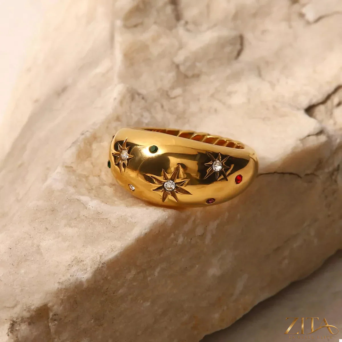 18K gold-plated zircon ring with sparkling stones, elegant jewelry piece from Zita La Belle Elite displayed on a white background.