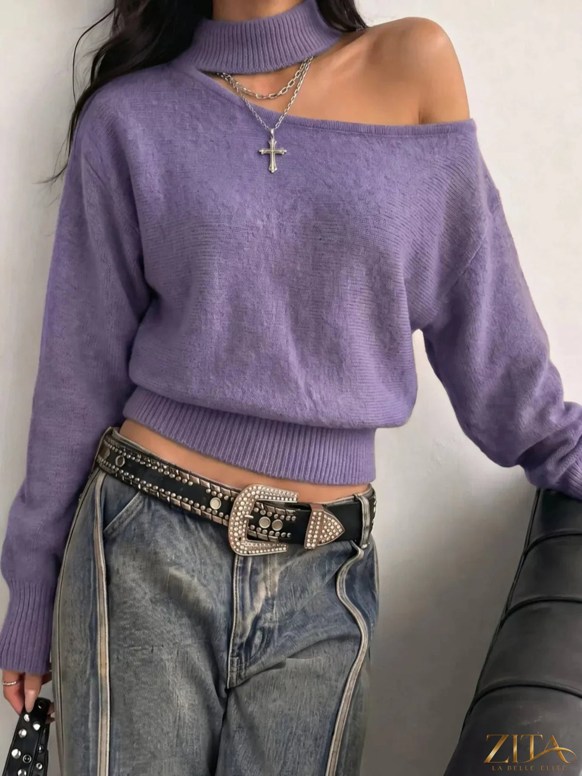 Cold-shoulder dropped shoulder sweater by Trendsi featuring a cozy knit fabric and stylish cut-out shoulder design.