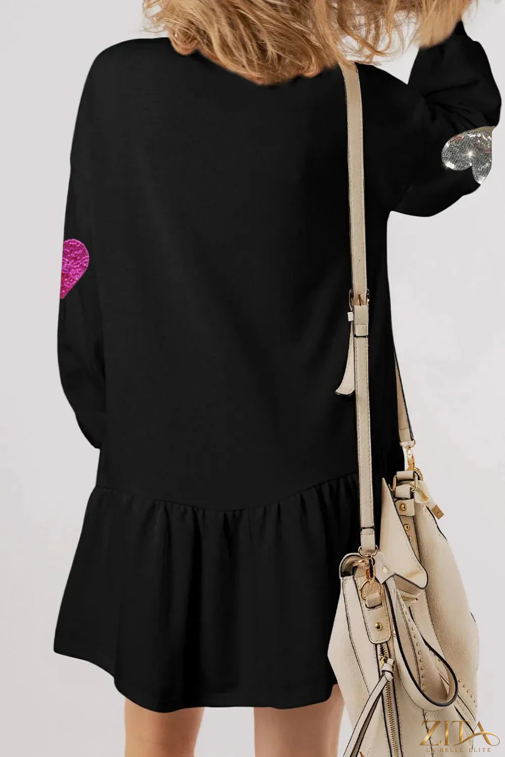 Zita La Belle Elite sequin heart round neck long sleeve mini dress showcasing shiny sequins and a fitted silhouette.