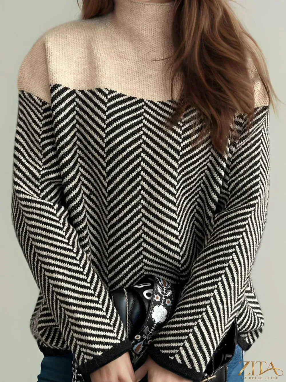 Contrast turtleneck long sleeve sweater by Trendsi, shown in black and white with a fitted design and ribbed cuffs.