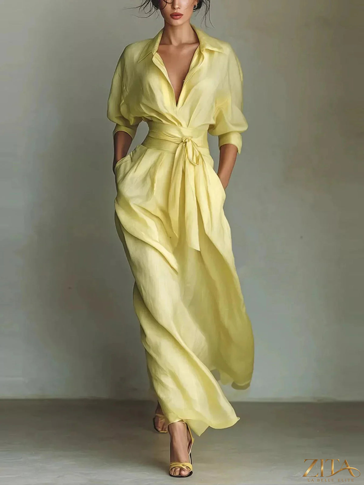 Maxi dress with waist-defining sash by Trendsi, featuring a flowy design and elegant neckline, perfect for summer outings.