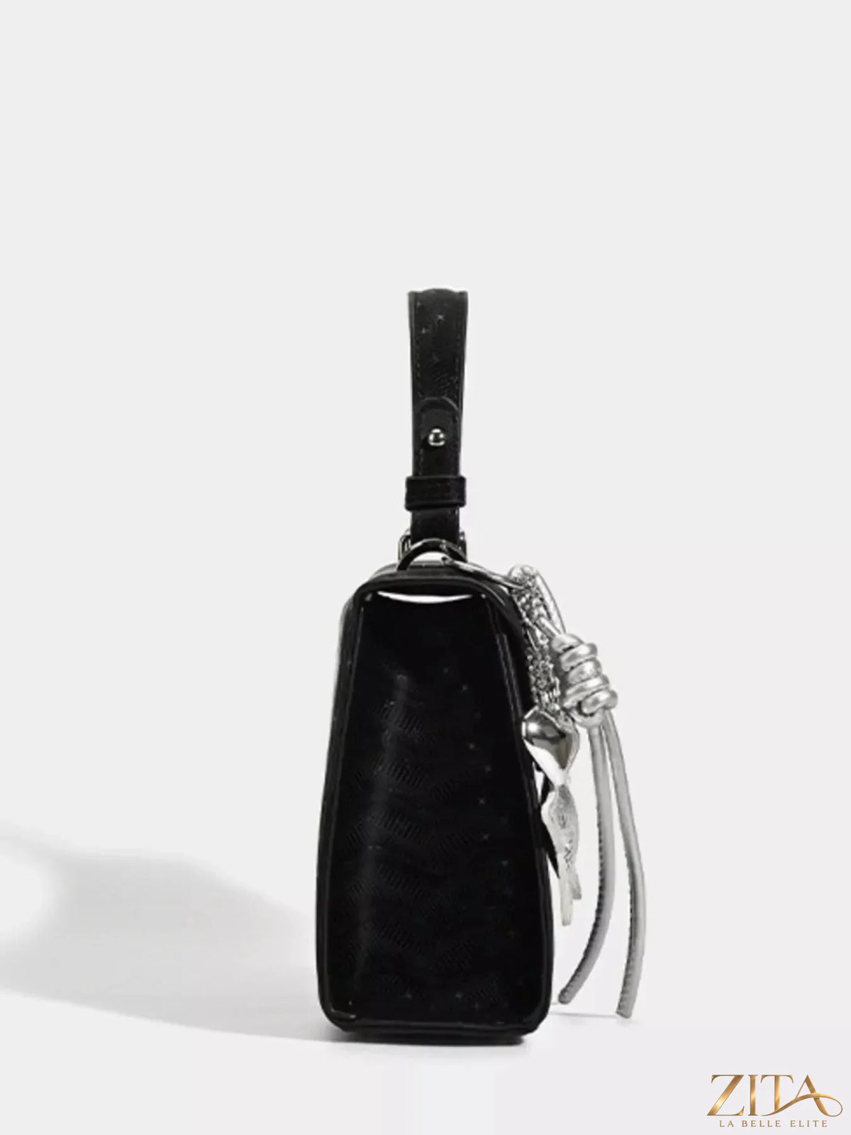 Zita La Belle Elite buckle leather handbag with adjustable strap and gold-tone hardware on smooth brown leather.