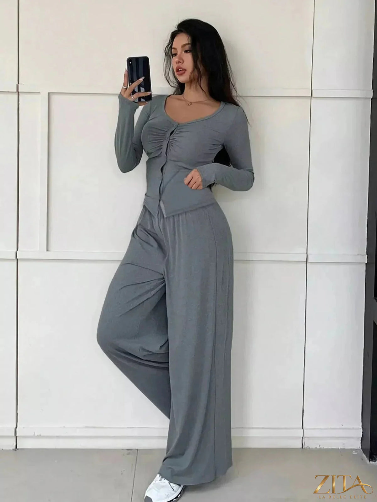 Zita La Belle Elite button-down top and wide-leg pants set in a stylish, coordinated outfit with a modern, elegant look.
