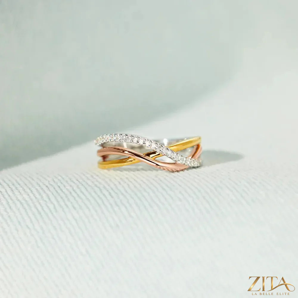 Gold-plated sterling silver crisscross ring by Zita La Belle Elite, showcasing a stylish intertwined band design.