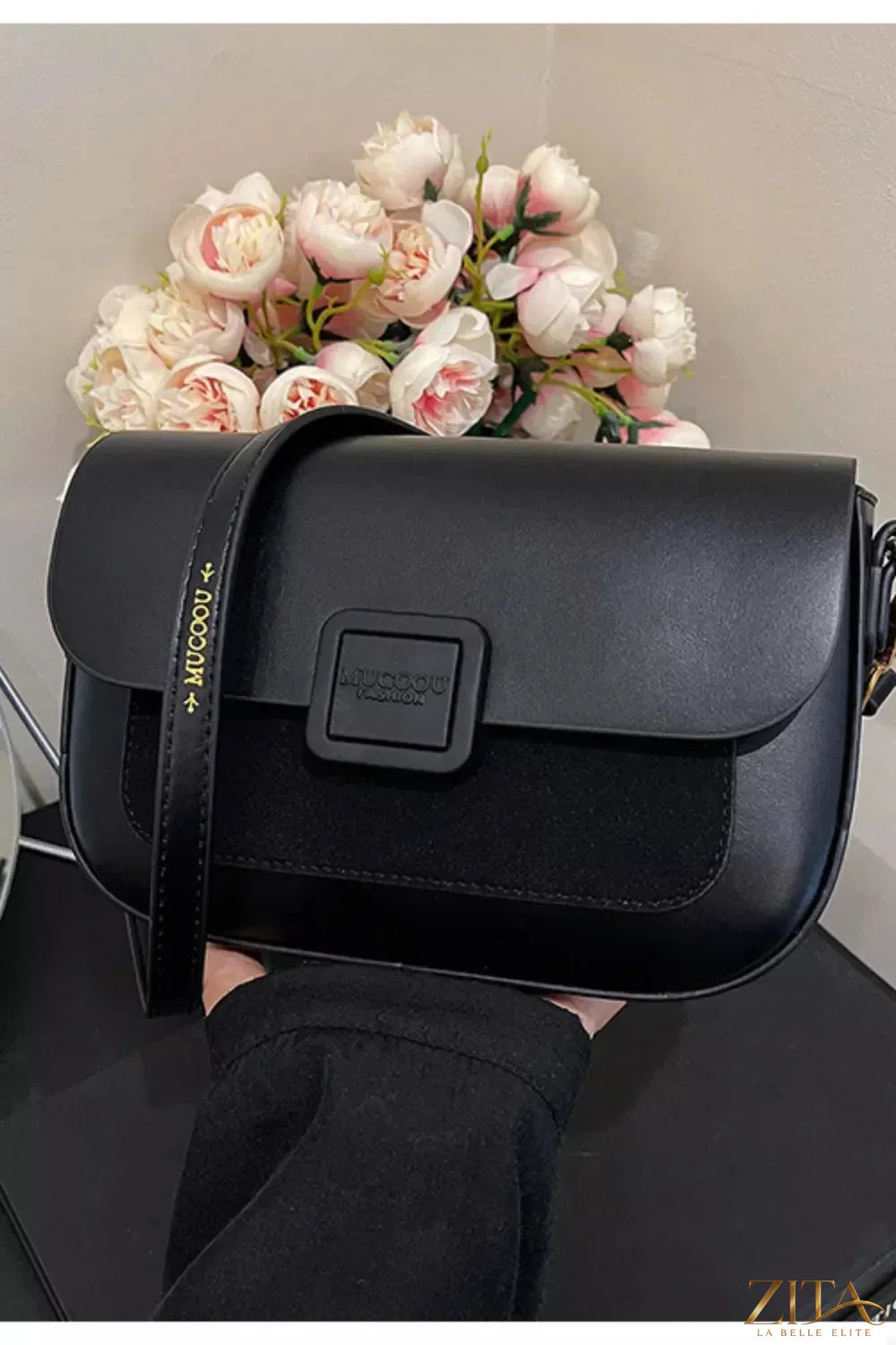 Zita La Belle Elite flap closure shoulder bag with adjustable strap and stylish design, featuring a sleek leather exterior.