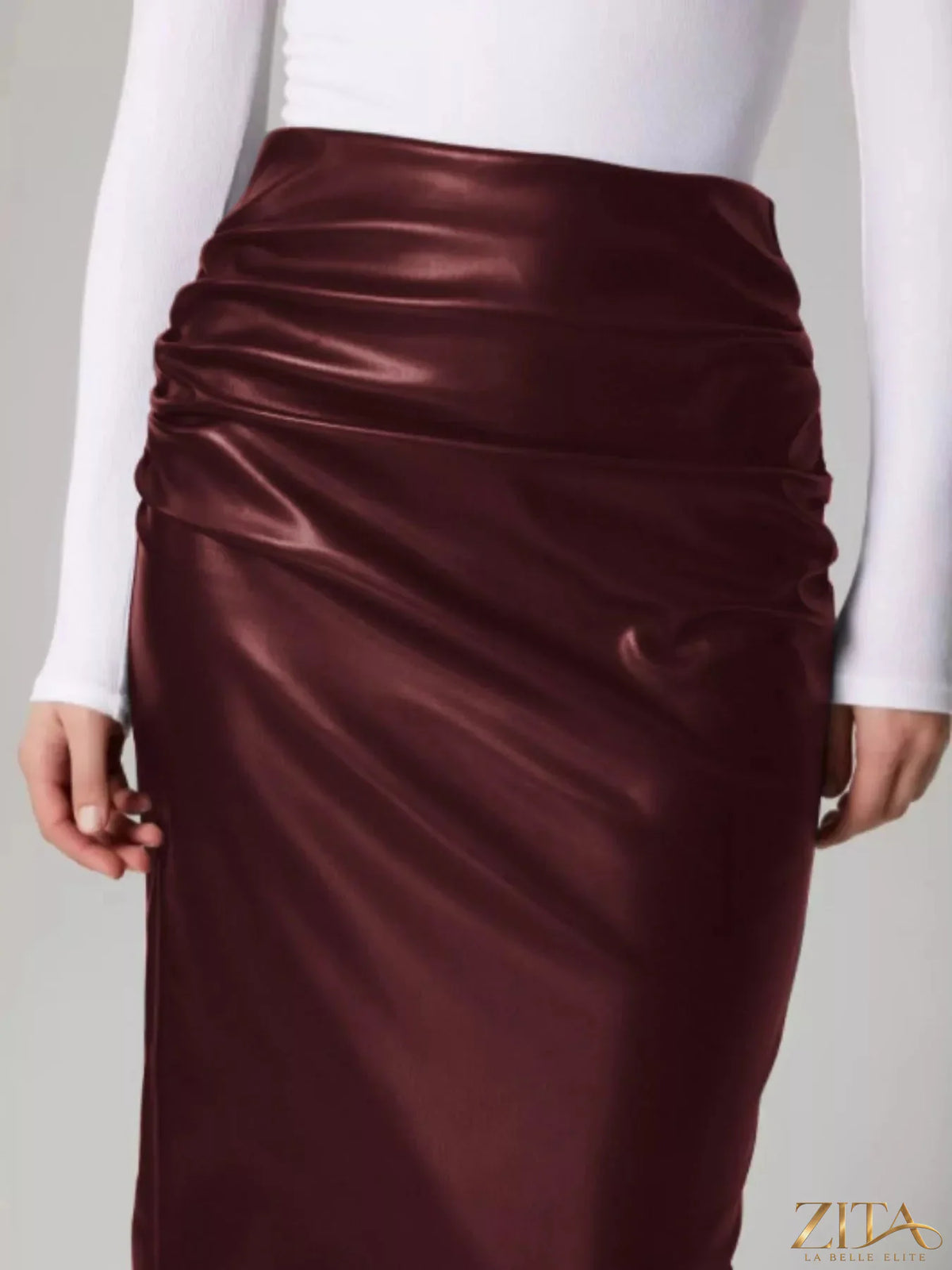 Zita La Belle Elite slit back leather skirt shown on a model, featuring a fitted silhouette and stylish slit detail.