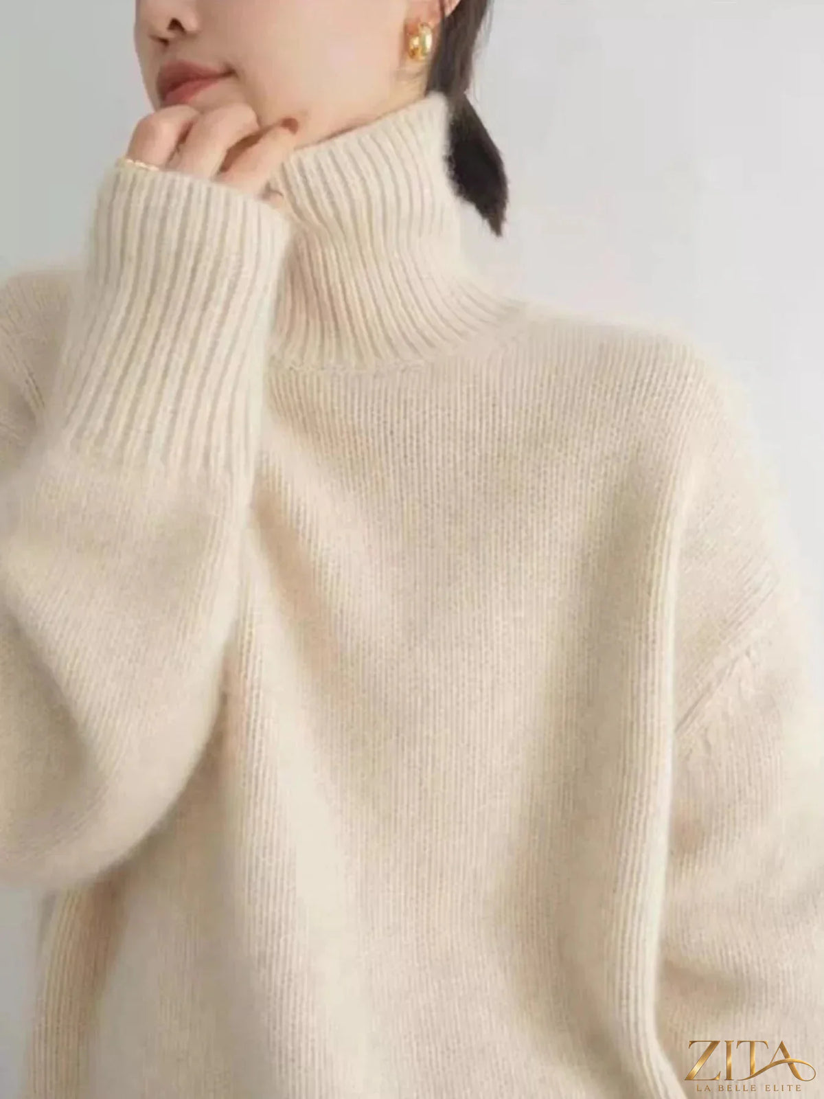 Zita La Belle Elite dropped shoulder turtleneck sweater in soft knit fabric, showcasing a relaxed fit and classic design.