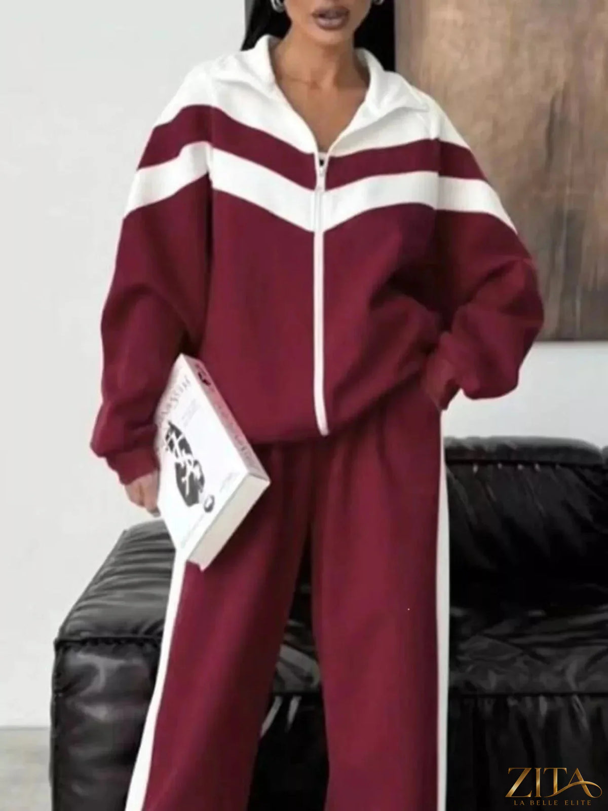Color block Zita La Belle Elite zip-up outerwear and pants set, featuring vibrant panels and a sporty, casual style.