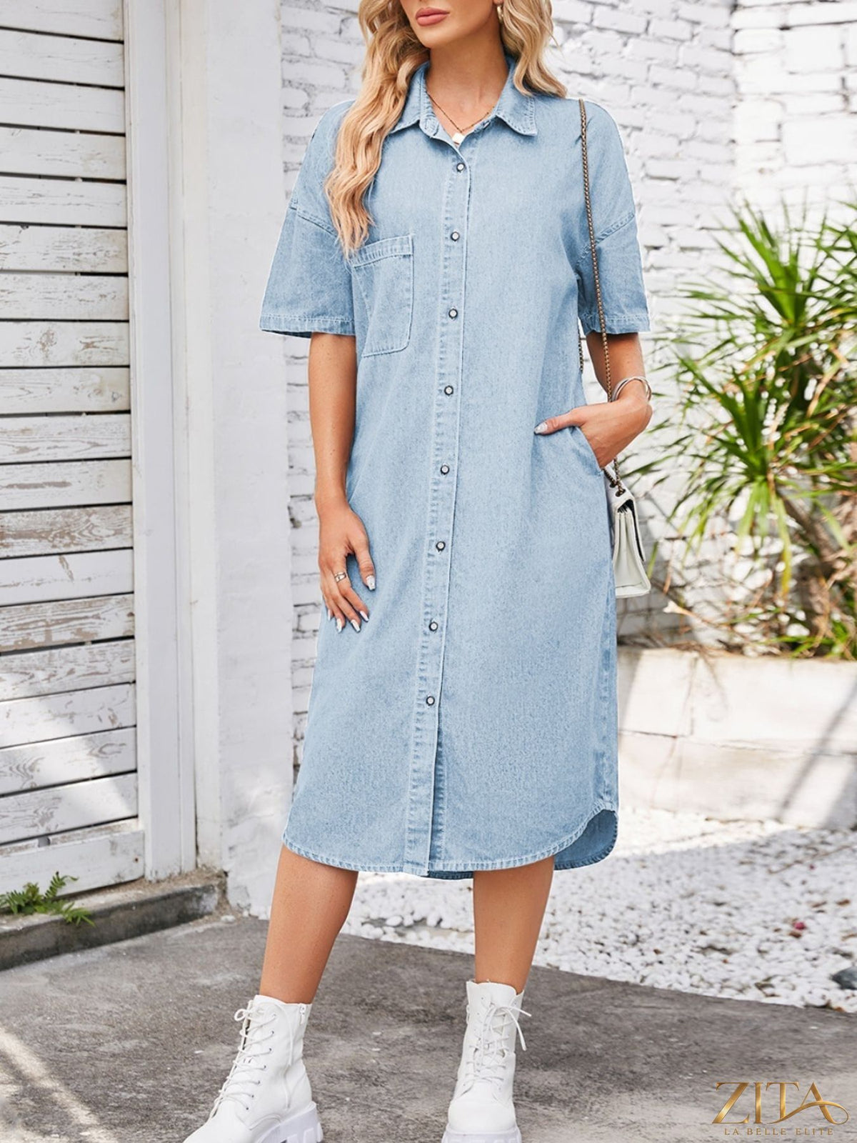 Zita La Belle Elite casual button-down half sleeve denim dress displayed on a hanger, showcasing classic blue denim fabric.