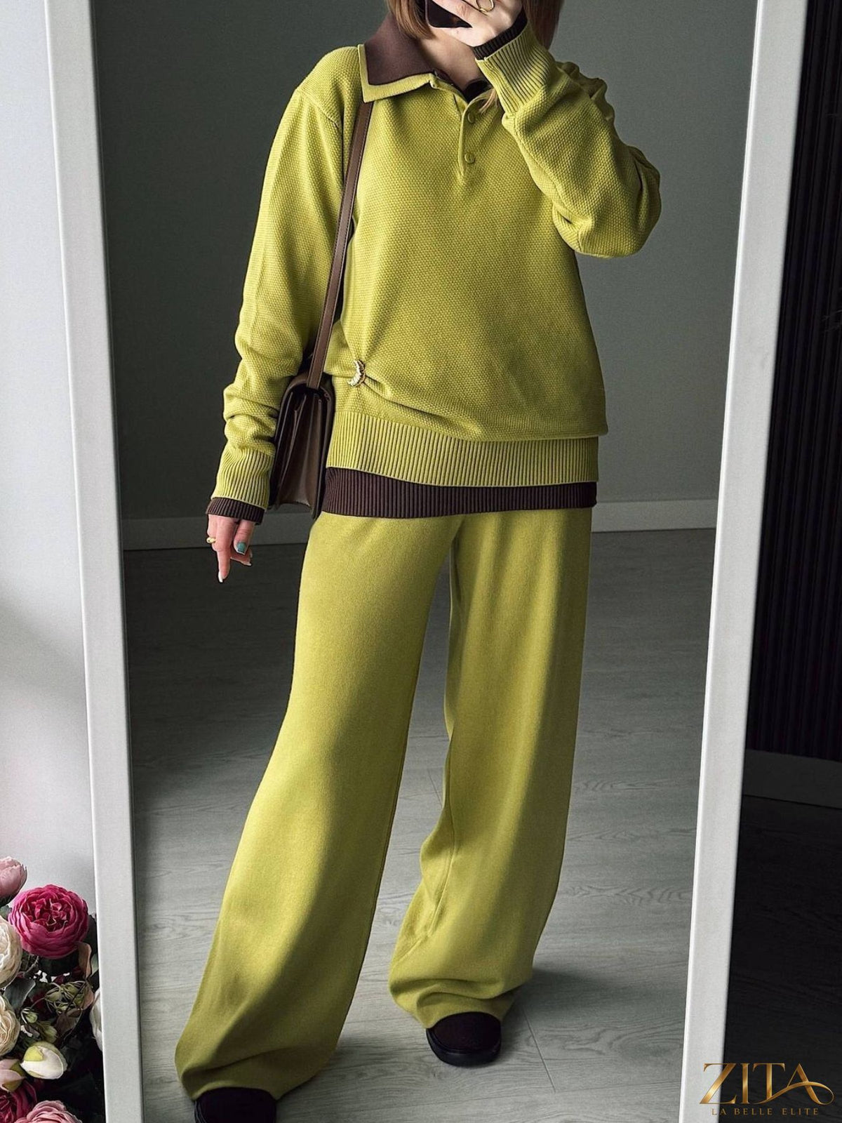 Zita La Belle Elite knit set featuring a polo collar top with matching pants or skirt, displayed on a neutral background.