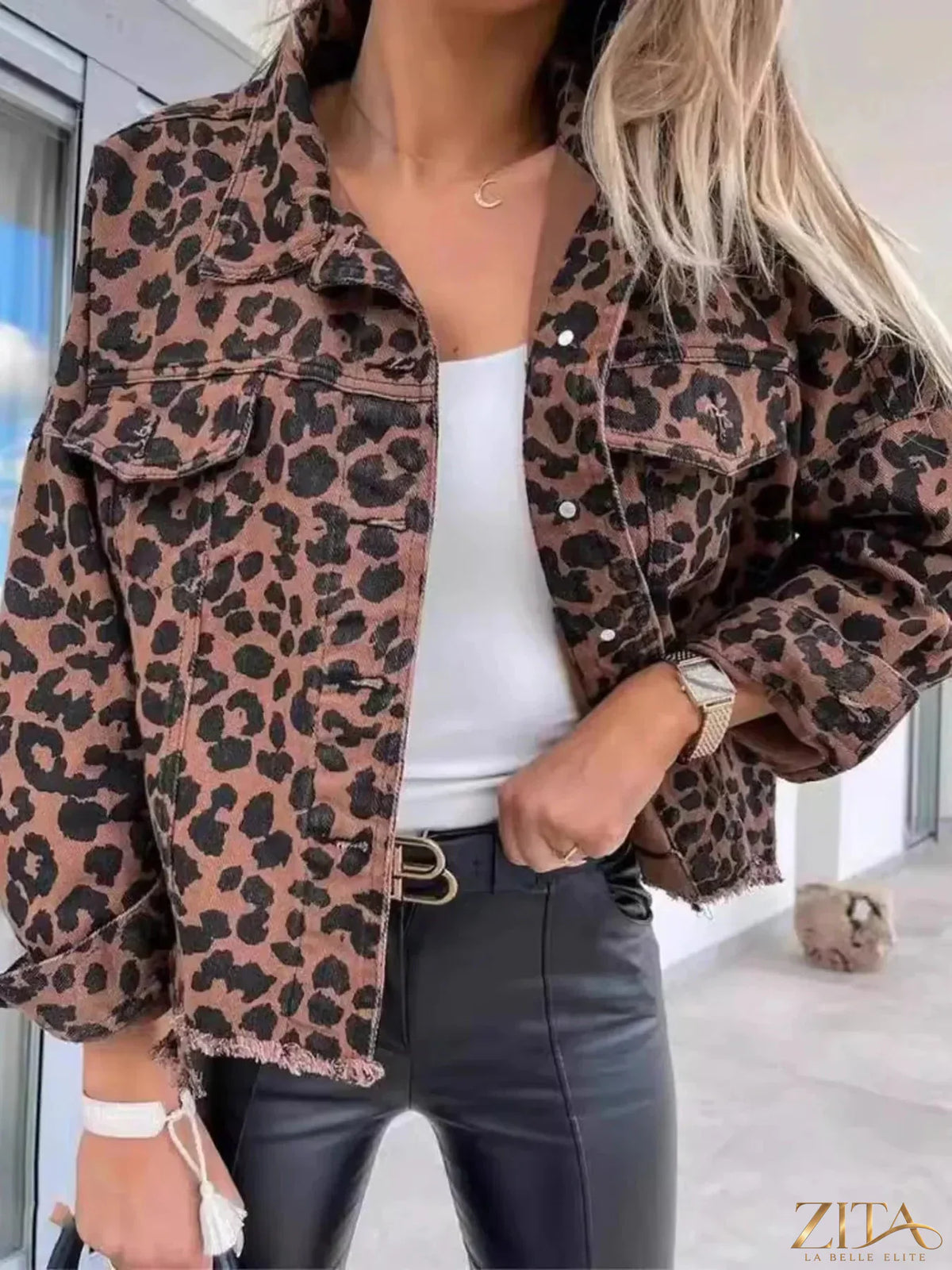 Leopard print raw hem denim jacket by Zita La Belle Elite, featuring animal print fabric and distressed raw hem style.