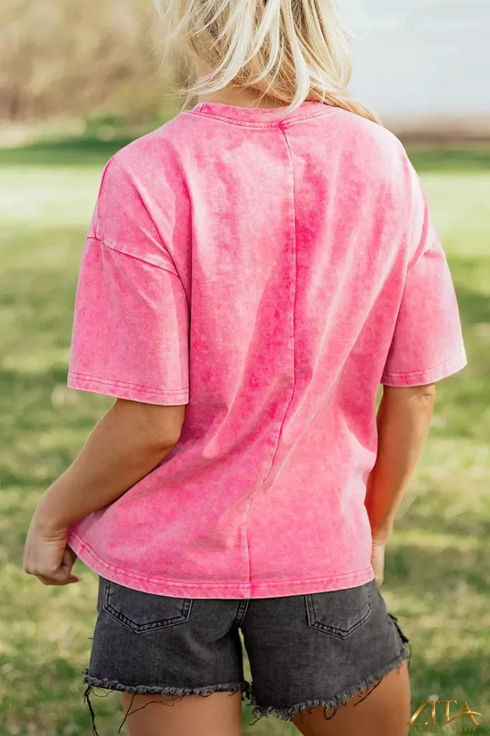 Mineral washed solid color cotton oversized T-shirt by Trendsi, relaxed fit with soft fabric, displayed on a plain background.