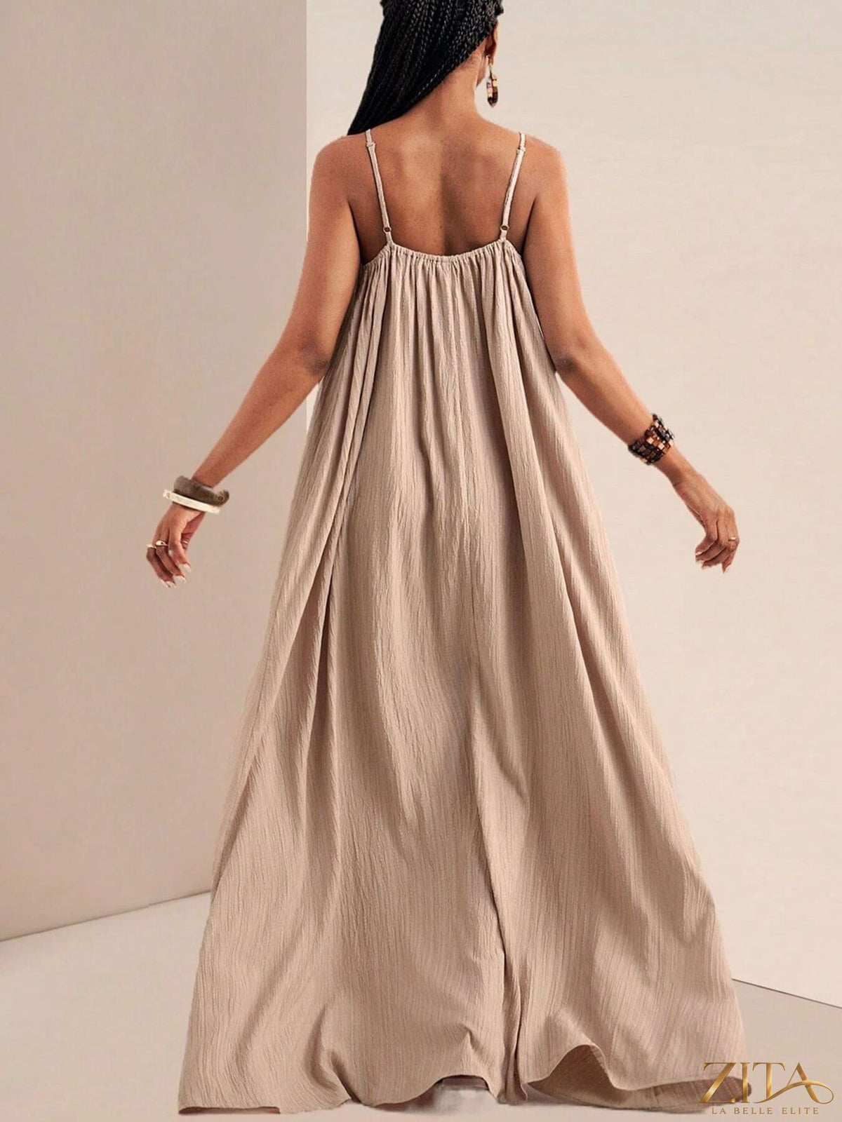 Flowy maxi dress with spaghetti straps by Zita La Belle Elite, featuring a lightweight, elegant design perfect for summer wear.