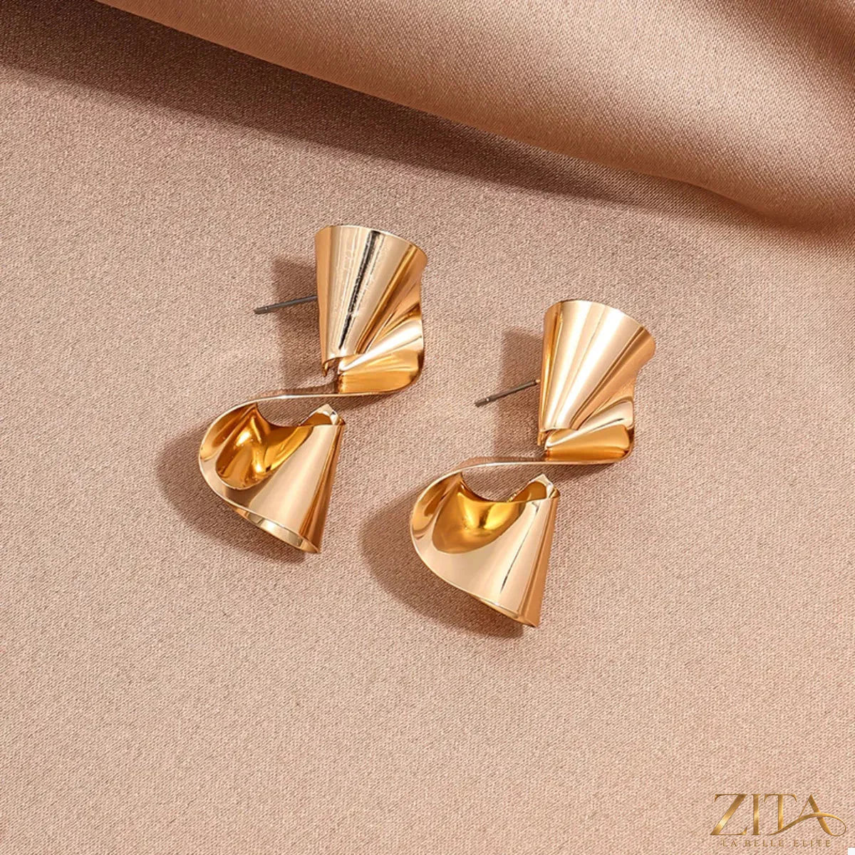 Elegant 18K gold-plated twist earrings by Zita La Belle Elite showcasing sleek, modern jewelry design with a polished finish.