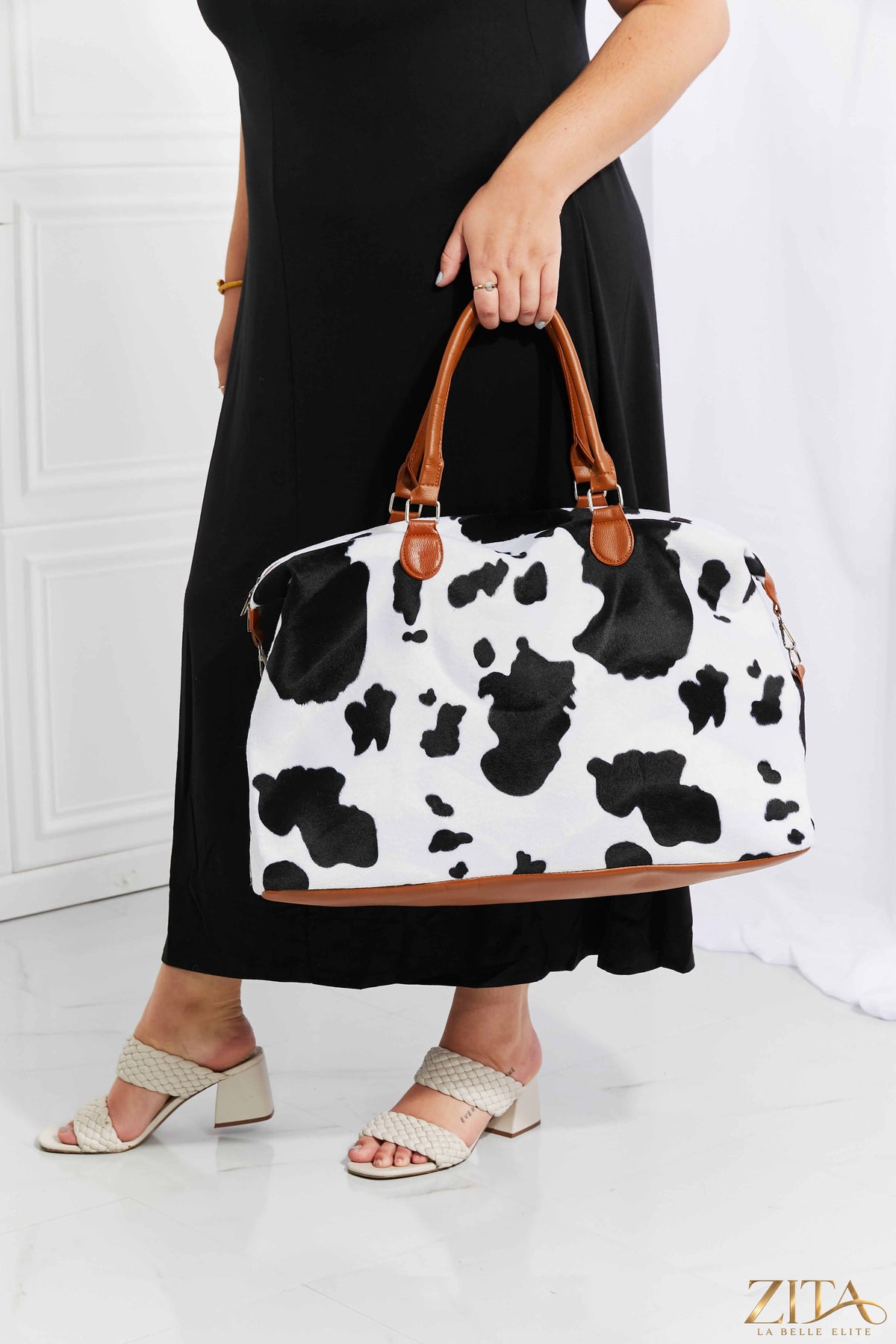 Zita La Belle Elite animal print plush weekender bag with sturdy handles and spacious interior for travel and weekend trips.