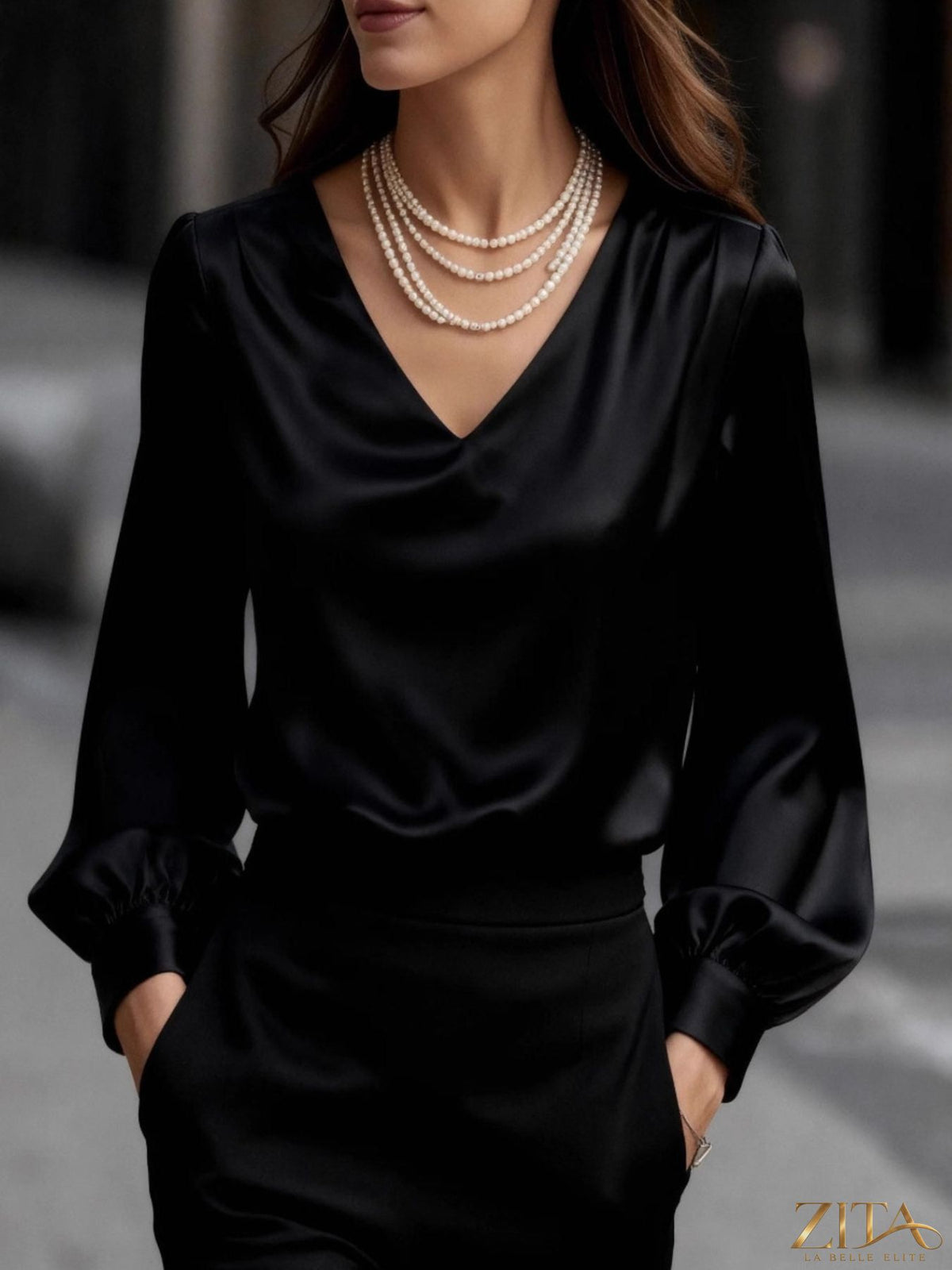 Zita La Belle Elite satin V-neck long sleeve blouse in soft pink, with a smooth, shiny fabric and elegant drape.