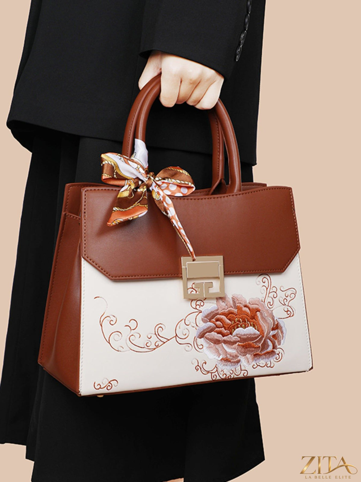 Zita La Belle Elite floral top handle handbag with colorful flower pattern and elegant design.