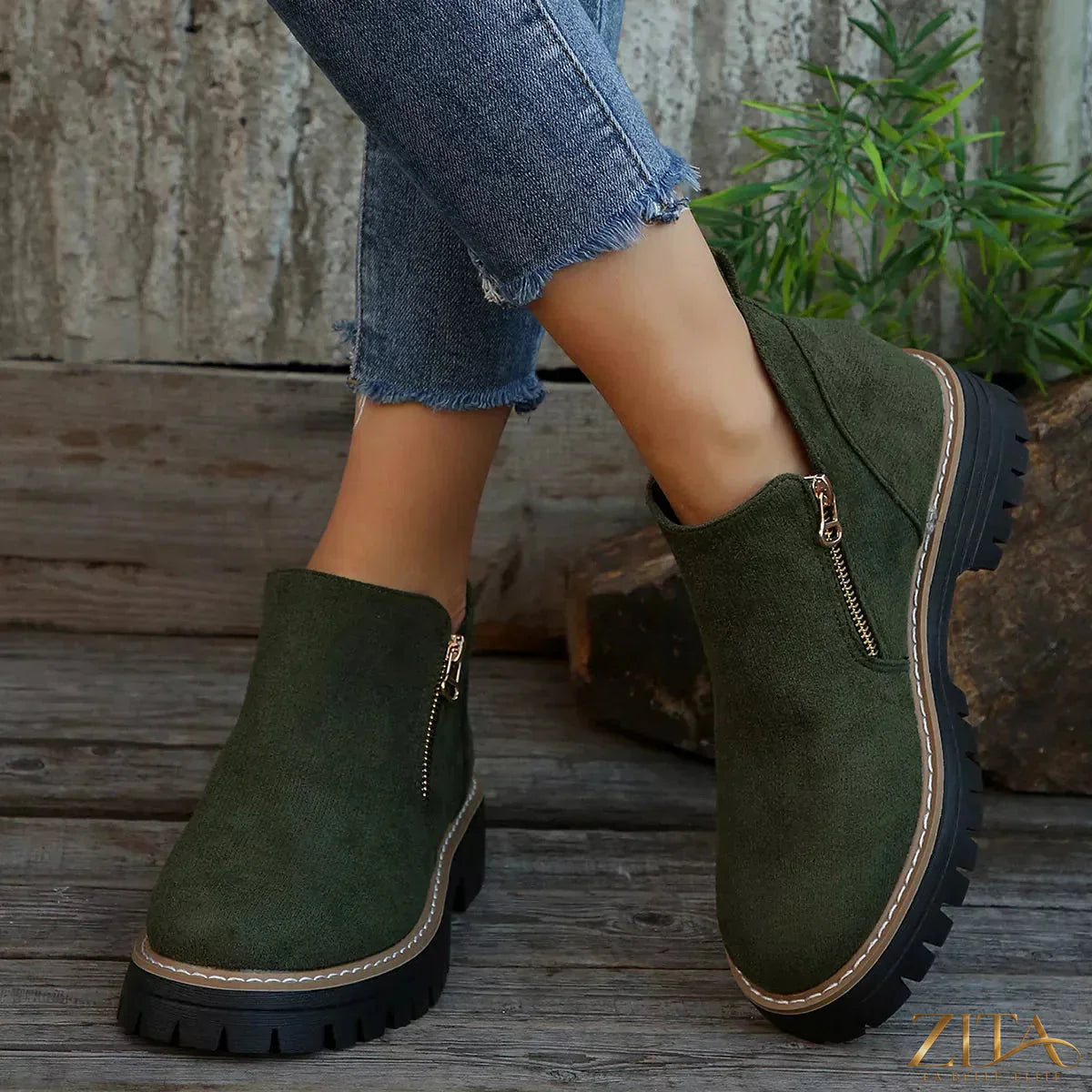 Zita La Belle Elite ankle boots with zipper detail, showcasing stylish black leather design and side zipper closure.
