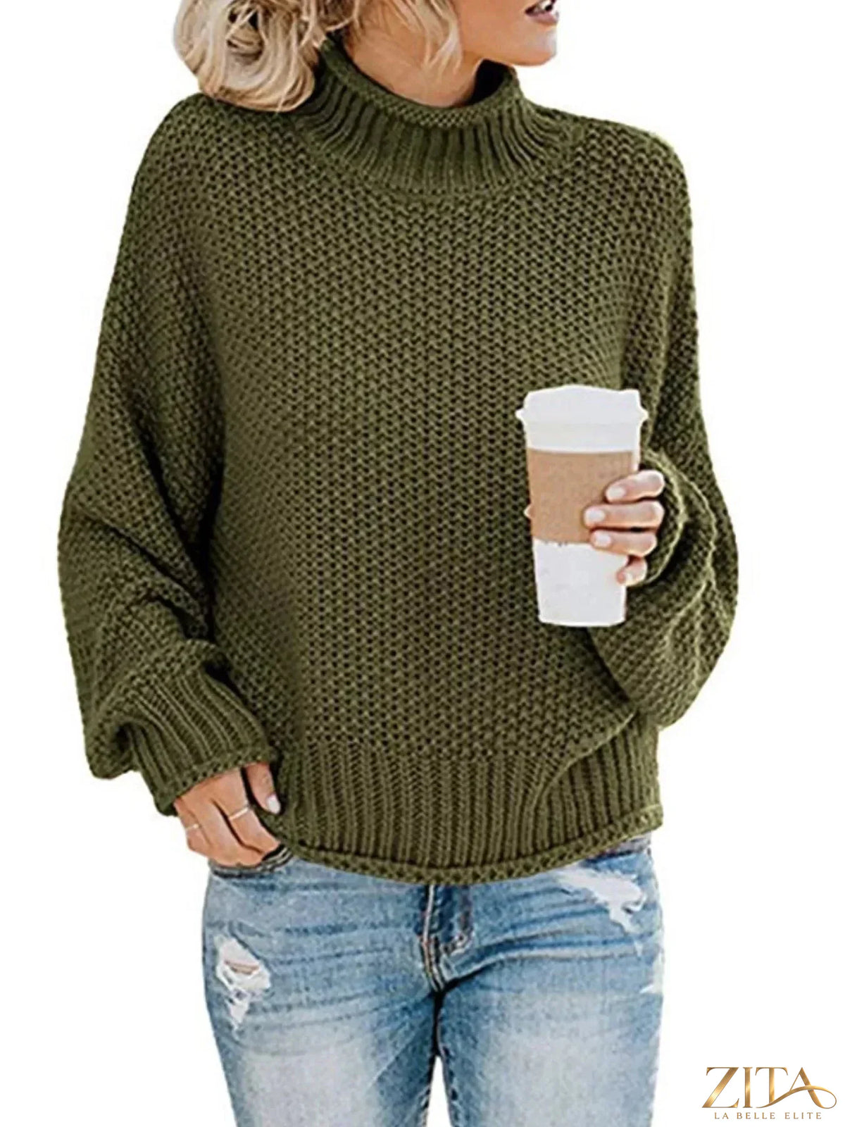 Zita La Belle Elite chunky knit turtleneck sweater in warm cream with oversized fit and textured knitting pattern.