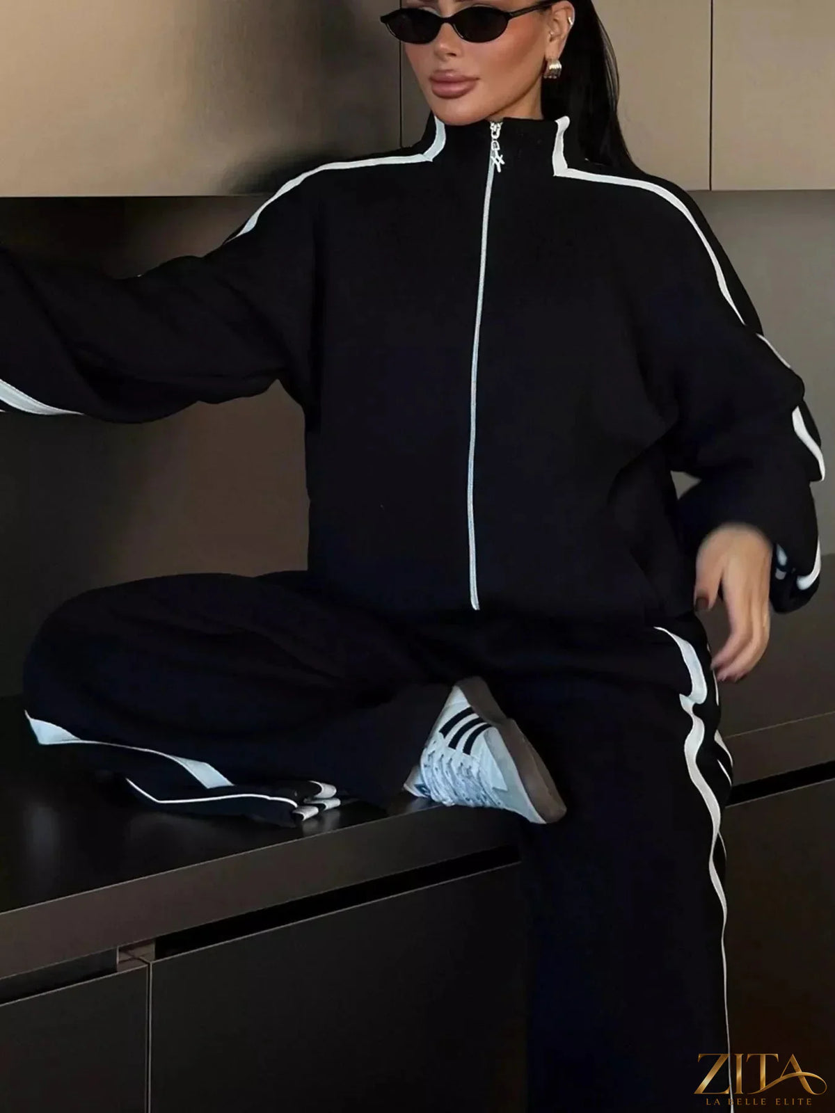 Zita La Belle Elite side stripes zip-up top and pants set, black and white athletic two-piece outfit with side stripe details.