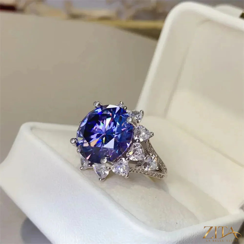 Sterling silver ring with a 10-carat moissanite gemstone, featuring a sleek design and polished finish.