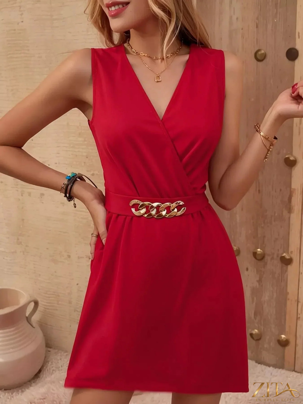 Sleeveless surplice mini dress by Trendsi featuring a fitted silhouette, V-neckline, and stylish design perfect for summer.